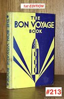 Front cover view of first edition The Bon Voyage Book, showing Art Deco yellow and blue cover and title.