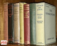 Full side view of all eight vintage books upright on shelf, showing spines with titles and some dust jackets.