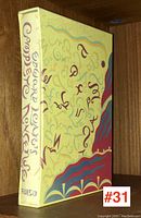 Spine and side of the slipcase showing title and playful letter design