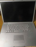 Open view of 17-inch PowerBook G4 showing screen, keyboard and trackpad