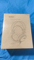 Front of sealed Aukey 7.1 Channel RGB gaming headset box