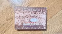Front of box showing title, Ken Burns documentary reference, historic team photo