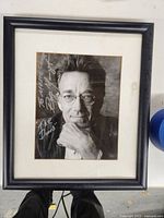 Frontal view of the framed signed black and white photo of Ray Manzarek.