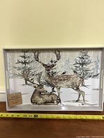 Decorative serving tray showing two deer in snowy forest scene, measuring about 15 inches wide