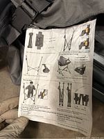 Instruction sheet showing how to set up and fold the hammock chair with diagrams, attached to the chair.