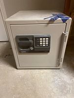 Front view of safe showing door, handle, keypad and key lock