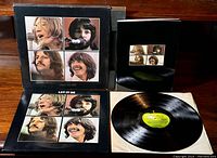 Box set cover with The Beatles member photos, Get Back book, vinyl LP in sleeve