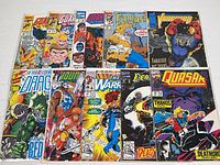 Lot of 10 Marvel comics laid out on a surface showing various covers including Guardians of the Galaxy, Fantastic Four, The Avengers, The Shadow Dragon, The New Warriors, Deathlok, and Quasar.