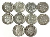 Obverse side of 10 silver Roosevelt dimes showing President Franklin D. Roosevelt's profile and dates from 1950s.