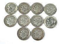 Obverse view showing the profile of President Roosevelt on each of the 10 silver Roosevelt dimes, dated between 1941 and early 1960s, some coins showing wear but details clear.