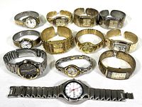 Overview of 14 men's and women's wristwatches with metal bands, showing various face shapes and band styles including cuffs, link bracelets, and expansion bands in silver and gold tones.