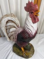 Full side view of the vintage ceramic rooster showing detailed feathers and color pattern