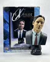 Front view of bust with original box showing The X Files Fight the Future logo and artist information.