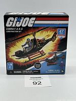 Boxed G.I. Joe Cobra F.A.N.G 47-piece construction set featuring illustrated helicopter and pilot, front view with clear labeling.