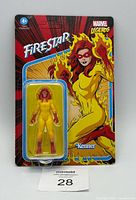 Front view of Marvel Legends Retro Collection Firestar action figure in sealed blister packaging, showing character in yellow and red suit with flame artwork on card.