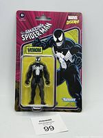 Front of the carded Marvel Legends Venom action figure from Kenner showing figure and artwork