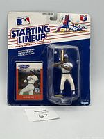 Front view of the packaged Starting Lineup figure of George Bell of the Toronto Blue Jays. Shows figure and collectible card inside original packaging with logos and branding.