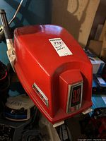 Red and white CHRY 9.2 horsepower outboard motor, front angle view showing number 9.2 on red cover.