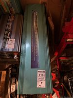 Top view of teal colored large metal Power Jack PI-100000 inverter unit showing the label and overall condition.