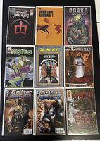 Nine comic books arranged in a 3x3 grid including titles The Greatest American Hero, Doctorkillers 1, Grave, Gimos 9, Gun Fu, The Gatesville Company, Grifter Midnight 1 and 2, and Swamp.