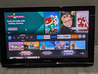 Front view of Panasonic 45 inch plasma TV powered on displaying user interface with apps