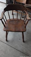 Old wooden chair showing overall condition and design