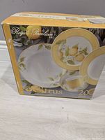 Closed retail box showing the Royal Porcelain brand and Citrus line with images of dinnerware set featuring lemons and yellow border.
