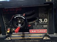 Close-up of the Craftsman table saw control panel showing model number and specifications including 3.0 horsepower motor.
