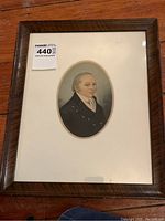 Framed 19th century naval gentleman watercolor portrait in oval format on speckled paper, showing full frame and matting.