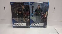Two GI Joe Classified Series action figure packages featuring Flint and Zartan, sealed in original packaging with art and logos visible.