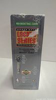 Front side of the sealed gray locker-style box with lock and handle graphics, showing Upper Deck Locker Series branding and condition sealed in shrink wrap.