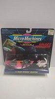 Front view of sealed Micro Machines Star Trek Galaxy Voyagers set with three miniature ships visible in blister pack.