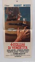 Full view of the Italian movie poster showing the graphic and title "4 Dollari Di Vendetta" with actor name Robert Woods.