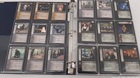 Open binder showing Lord of the Rings cards arranged in plastic sleeves, 4 per sleeve, featuring various characters and text.