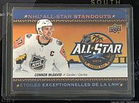 Front of the 2018-19 Upper Deck NHL All-Star Standouts Connor McDavid trading card showing player image, all-star logo, and card number AS-1.