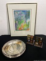 Framed M. Wagler limited edition print, silver plate, and brass enamel bookends together