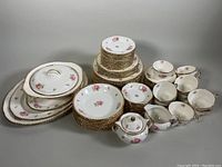 Full set of vintage Woods Ivory Ware dishes showing all included pieces assembled together.