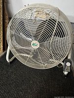 Front view of the 20-inch Mytek fan showing the protective grille, the three-blade black fan, and the Mytek logo at the center.