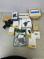 All items arranged on table showing boxes and some unpackaged items.