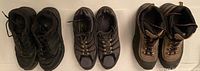 Photo showing all three pairs of shoes lined up: RR boots (left), Ozark Trail shoes (middle), New Balance shoes (right)