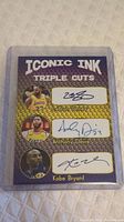 Front side of the Iconic Ink basketball card showing images and facsimile autographs of LeBron James, Anthony Davis, and Kobe Bryant.