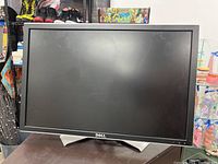 Front view of the 32-inch Dell widescreen monitor with a matte black display and Dell logo on the front bezel.