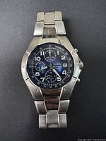 Full front view of the vintage Seiko chronograph watch showing the dial, subdials, date window, and stainless steel bracelet.