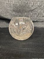 Crystal rose bowl front view showing the intricate pinwheel design and round shape.