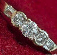 Close-up angled view of diamond cluster and shank