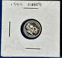 Front of the silver coin showing the political message criticizing Trudeau with maple leaf symbol.