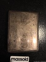 Top exterior view showing rectangular shape and surface scratches