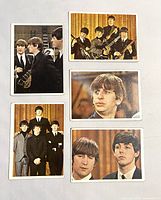 Front sides of 5 Beatles color trading cards showing band members in various poses and close-ups.