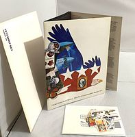 Photo of the 1977 USPS commemorative stamp set cover folder with patriotic eagle themed artwork.