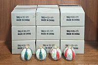 Stacked boxes of candles showing SKU and Made in China on sides.